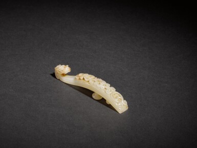 View full screen - View 1 of Lot 7. A white jade 'dragon' belthook, Song - Ming dynasty.