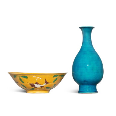 View full screen - View 1 of Lot 1197. Two glazed biscuit vessels, 19th / 20th century | 十九 / 二十世紀 孔雀藍釉長頸瓶及三彩魚紋盌.