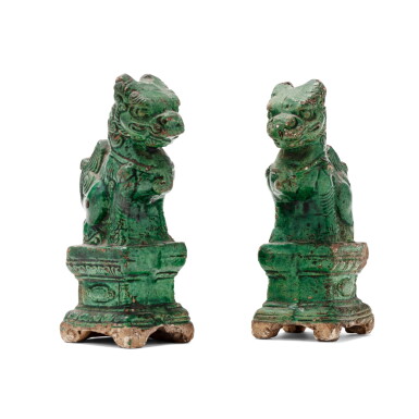 View full screen - View 1 of Lot 92. Two green-glazed seated mythical beasts, Qing dynasty, 17th century | 清十七世紀 青釉瑞獸坐像兩尊.