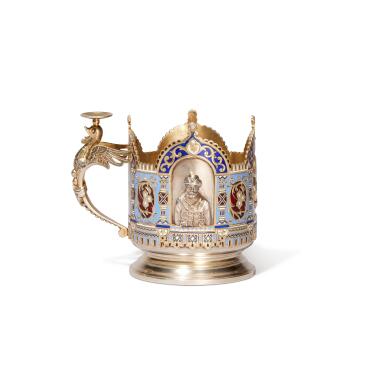 View full screen - View 1 of Lot 217. A parcel-gilt silver and champlevé enamel tea glass holder, maker’s mark Cyrillic U.G, Moscow, 1886.