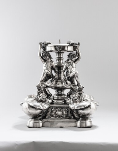 View full screen - View 1 of Lot 133. An Italian silver centerpiece after the Fontana delle Tartarughe place Mattei in Rome, Rome, 20th century | Fontaine en argent d'après la Fontana delle Tartarughe place Mattei à Rome, Rome, XXe siècle.