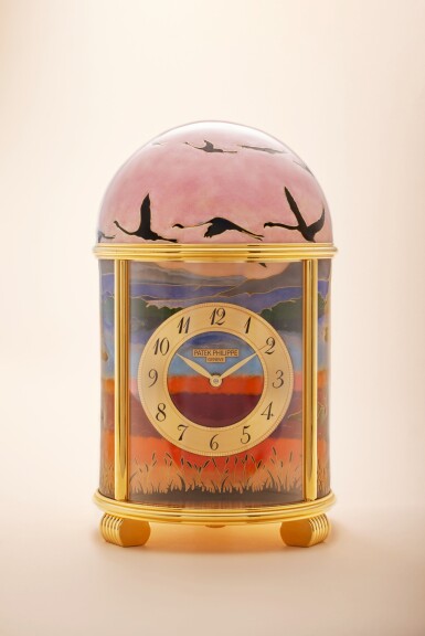 View full screen - View 1 of Lot 190. Reference 20071 'Lake in the Savannah' | A unique gilt brass dome clock with cloisonné enamel scene of flora and fauna in the savannah, Circa 2019 .