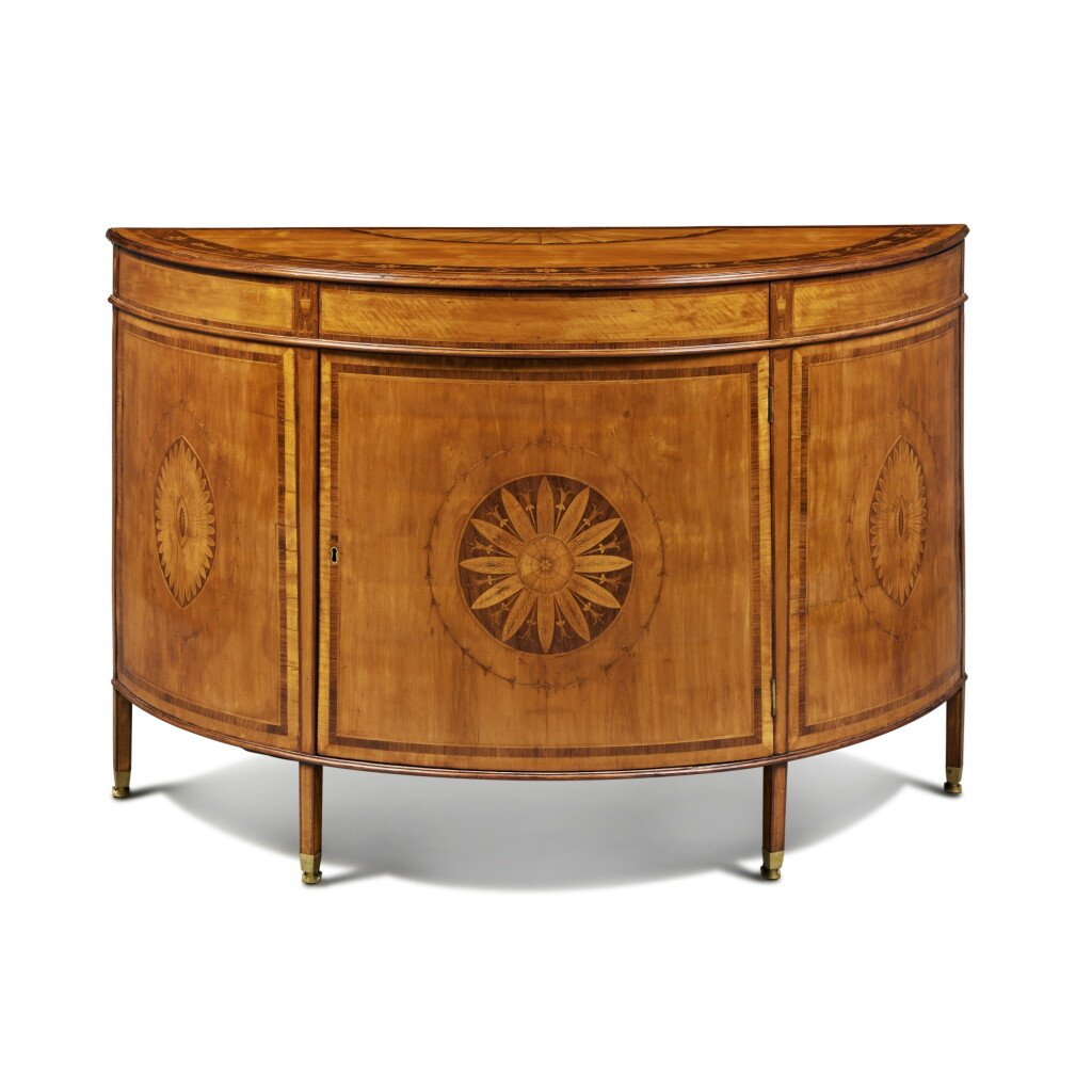 View full screen - View 1 of Lot 72. A George III Satinwood, Rosewood and Marquetry Commode, circa 1790, in the manner of Mayhew and Ince.