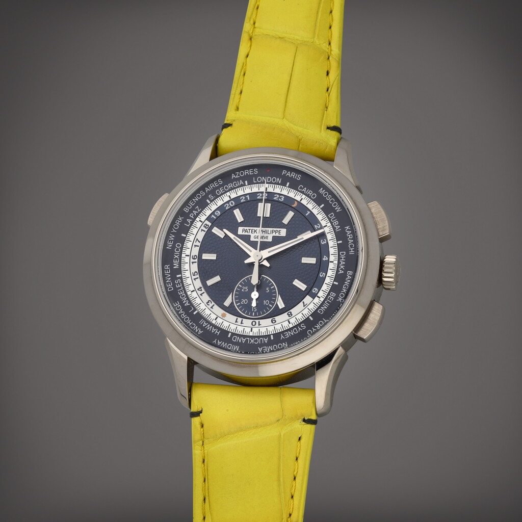 View full screen - View 1 of Lot 57. Reference 5930G-010 | A white gold world time flyback chronograph wristwatch | Circa 2019.