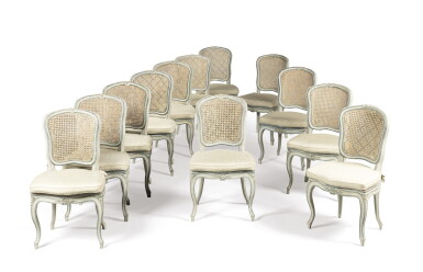 View full screen - View 1 of Lot 49. A set of twelve Louis XV style painted and caned side chairs | Suite de douze chaises en bois repeint de style Louis XV.