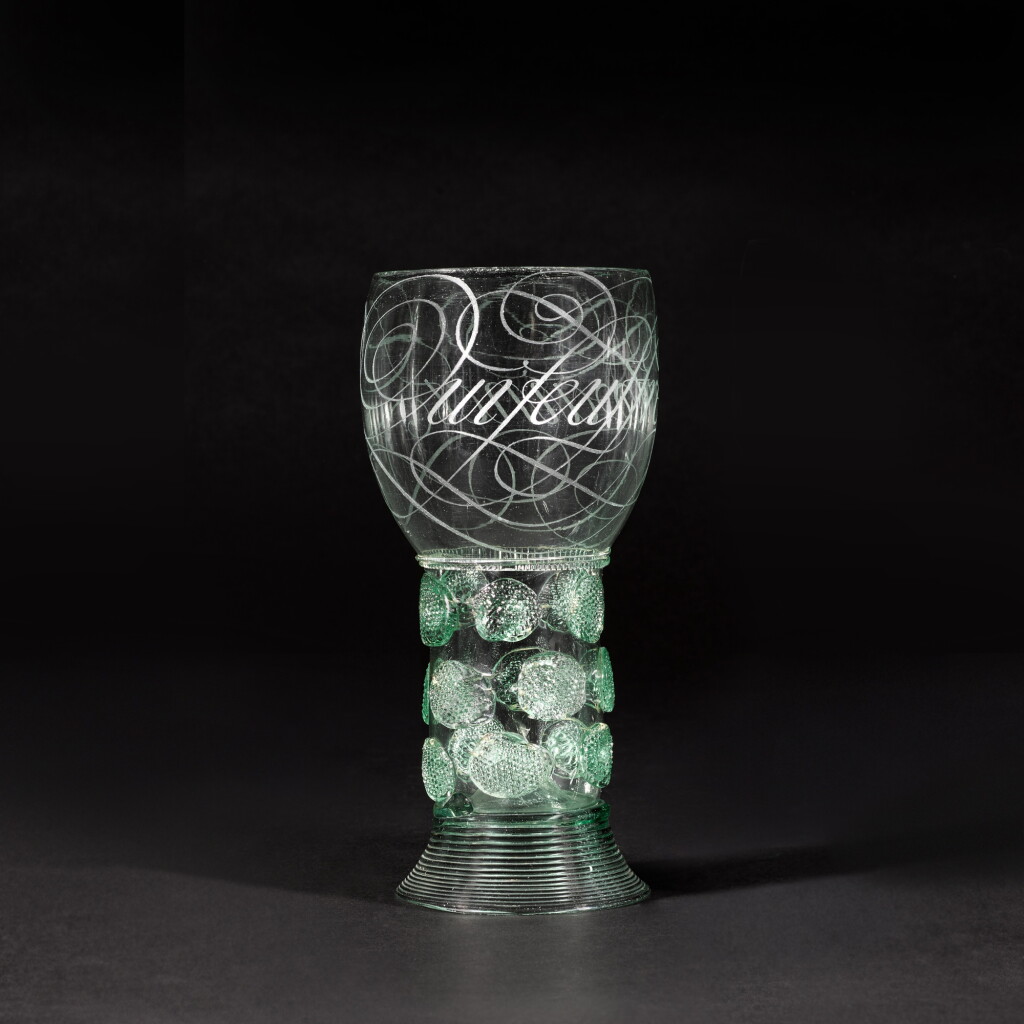 View full screen - View 1 of Lot 2. An important Dutch diamond-point engraved calligraphic green glass roemer by Willem Jacobszoon van Heemskerk, second half of the 17th century.