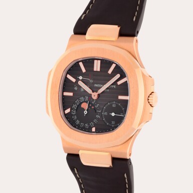 View full screen - View 1 of Lot 64. Nautilus, Reference 5712R-001 | A pink gold wristwatch with moon phases, date and power reserve indication | Circa 2020 .