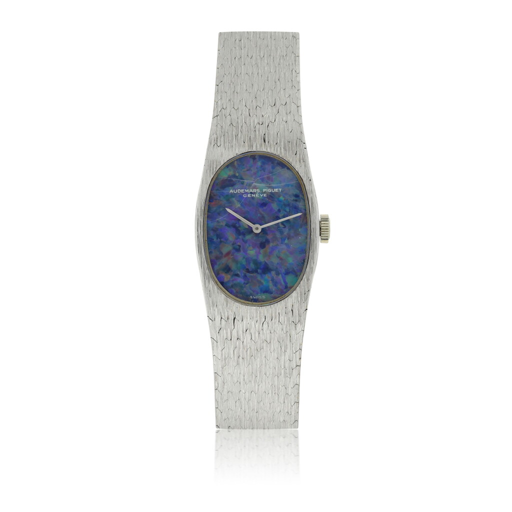 View full screen - View 1 of Lot 13. AUDEMARS PIGUET | REF 8439, A WHITE GOLD BRACELET WATCH WITH OPAL DIAL CIRCA 1970.