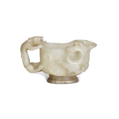 View full screen - View 1 of Lot 41. An archaistic white jade 'chilong' libation cup, 17th/18th century | 十七/十八世紀 白玉仿古螭耳盃.