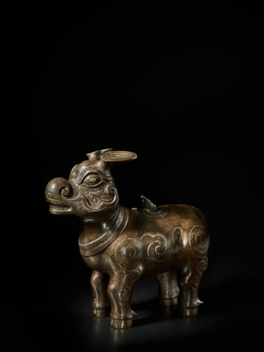 View full screen - View 1 of Lot 223. An archaistic gold and silver-inlaid bronze tapir-form vessel (Zun), Song - Ming dynasty | 宋至明 銅錯金銀犧尊.