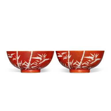 View full screen - View 1 of Lot 397. A pair of coral-ground reserve-decorated ‘bamboo’ bowls, Seal marks and period of Qianlong | 清乾隆 珊瑚紅地留白竹紋盌一對 《大清乾隆年製》款.