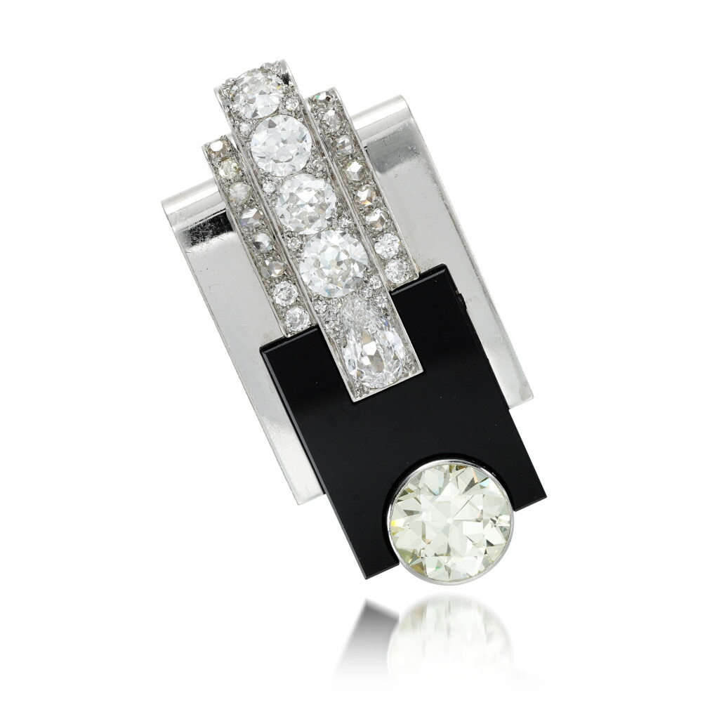 View full screen - View 1 of Lot 121. Onyx and diamond brooch, 1930s.