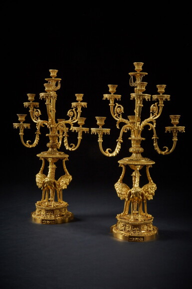 View full screen - View 1 of Lot 40. A PAIR OF LOUIS XVI STYLE GILT-BRONZE SEVEN-LIGHT CANDELABRA 'AUX AUTRUCHES', BY ALFRED-EMMANUEL BEURDELEY, AFTER THE MODEL BY FRANÇOIS RÉMOND, CIRCA 1870.