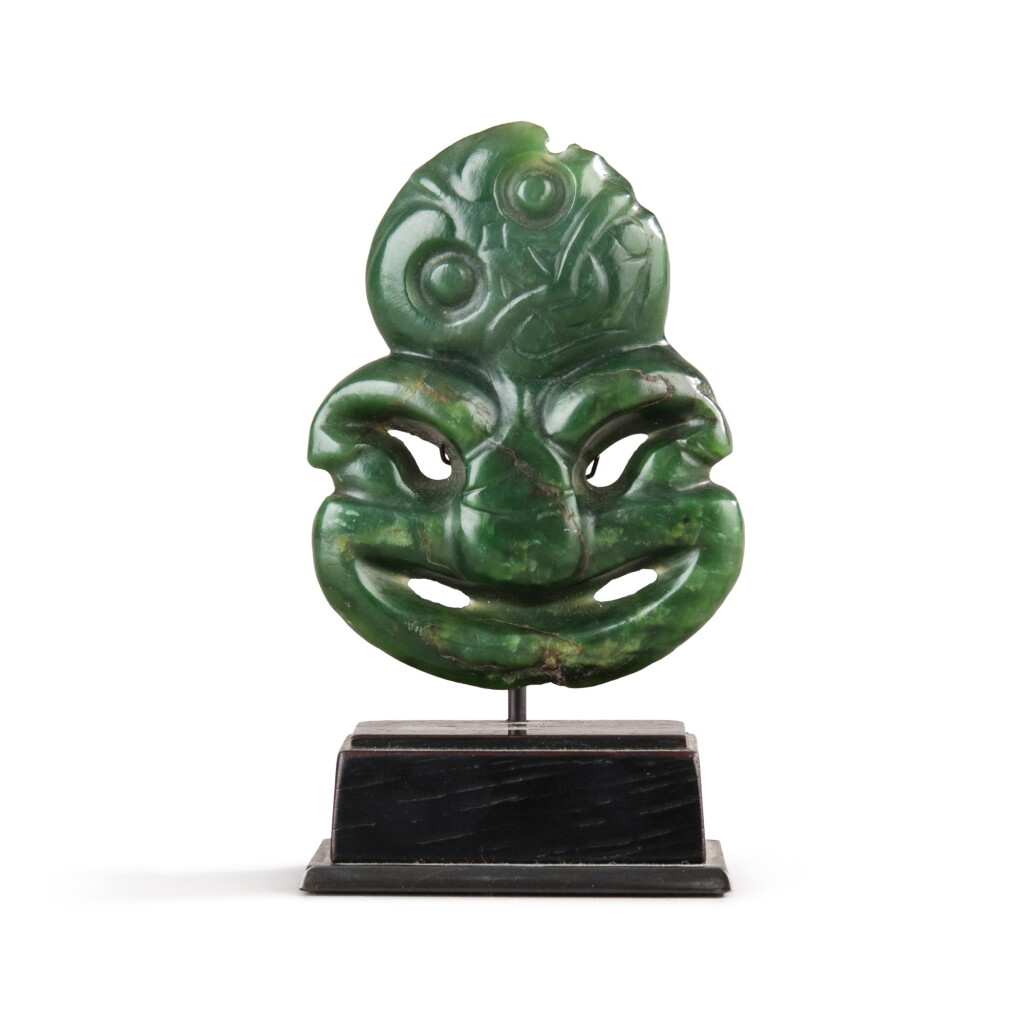 View full screen - View 1 of Lot 113. Maori Nephrite Hei Tiki, New Zealand | Pendentif Hei Tiki, Maori, Nouvelle-Zélande .