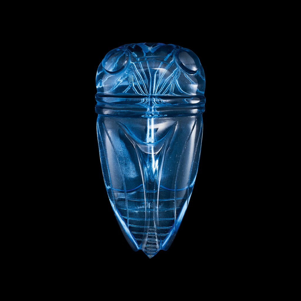 View full screen - View 1 of Lot 137. A blue glass figure of a cicada Qing dynasty, 19th century | 清十九世紀 透明藍料蟬.