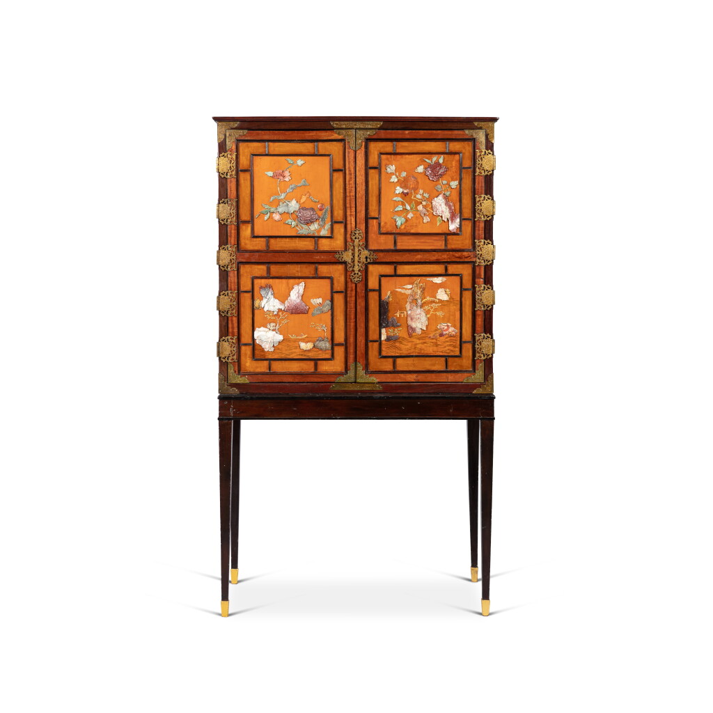View full screen - View 1 of Lot 9. A George III gilt-metal mounted camphor, amaranth and Indian rosewood cabinet, circa 1765, possibly by Mayhew and Ince, the Chinese soapstone-mounted panels, Qing Dynasty .