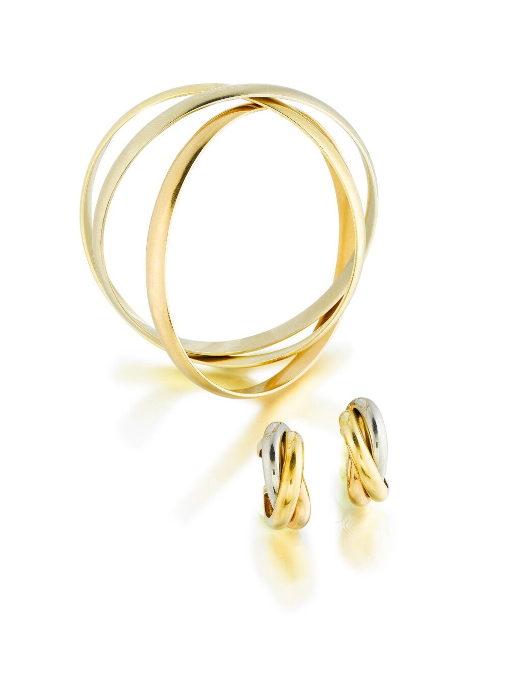 View full screen - View 1 of Lot 17. Gold bracelet and earrings, 'Trinity' | Bracelet et boucles d'oreille or, "Trinity".