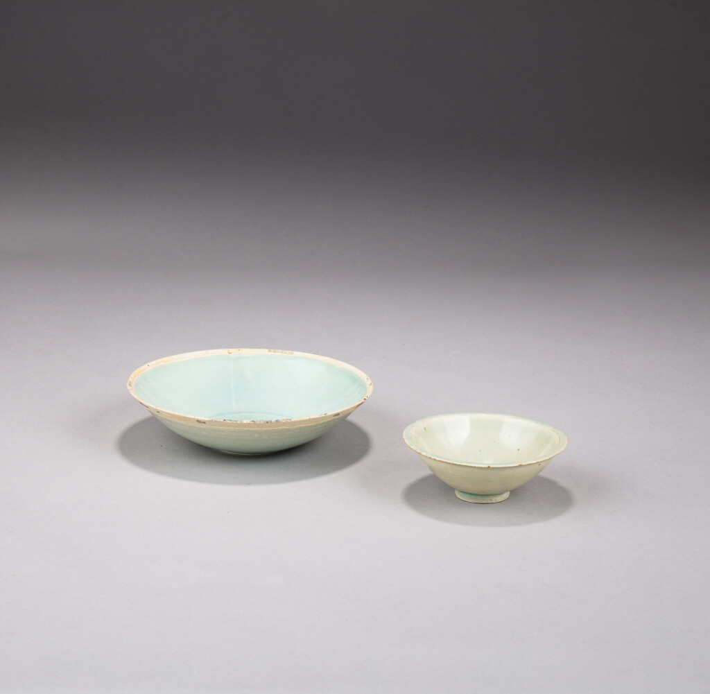 View full screen - View 1 of Lot 6. A Qingbai lobed cup and a Qingbai bowl, Song dynasty | 宋 青白釉花口盃及青白釉盌一組兩件.