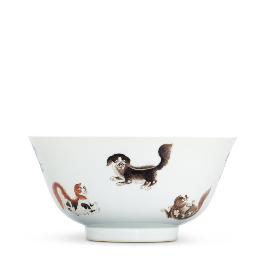 View full screen - View 1 of Lot 539. A large famille-rose 'dog' bowl, Mark and period of Daoguang, dated wushen year, corresponding to 1848 清道光戊申年(1848年) 粉彩瑞犬紋大盌 《道光戊申年製》款.