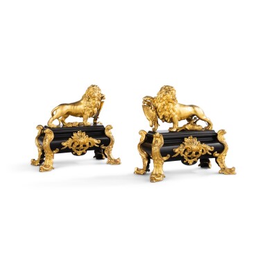 View full screen - View 1 of Lot 696. A pair of Régence gilt-bronze chenets, circa 1720.