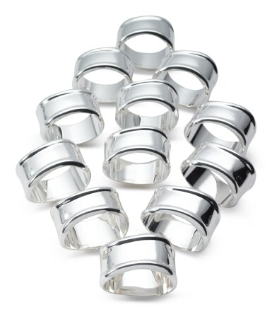 View full screen - View 1 of Lot 257. A SET OF TWELVE SILVER NAPKIN RINGS, DESIGNED BY ELSA PERETTI FOR TIFFANY & CO., NEW YORK, LATE 20TH CENTURY.