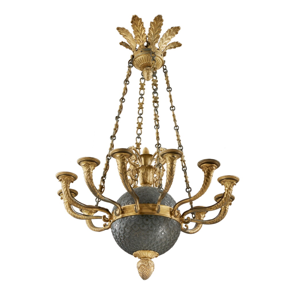 View full screen - View 1 of Lot 3. AN EMPIRE GILT AND PATINATED-BRONZE TWELVE-LIGHT CHANDELIER, EARLY 19TH CENTURY.