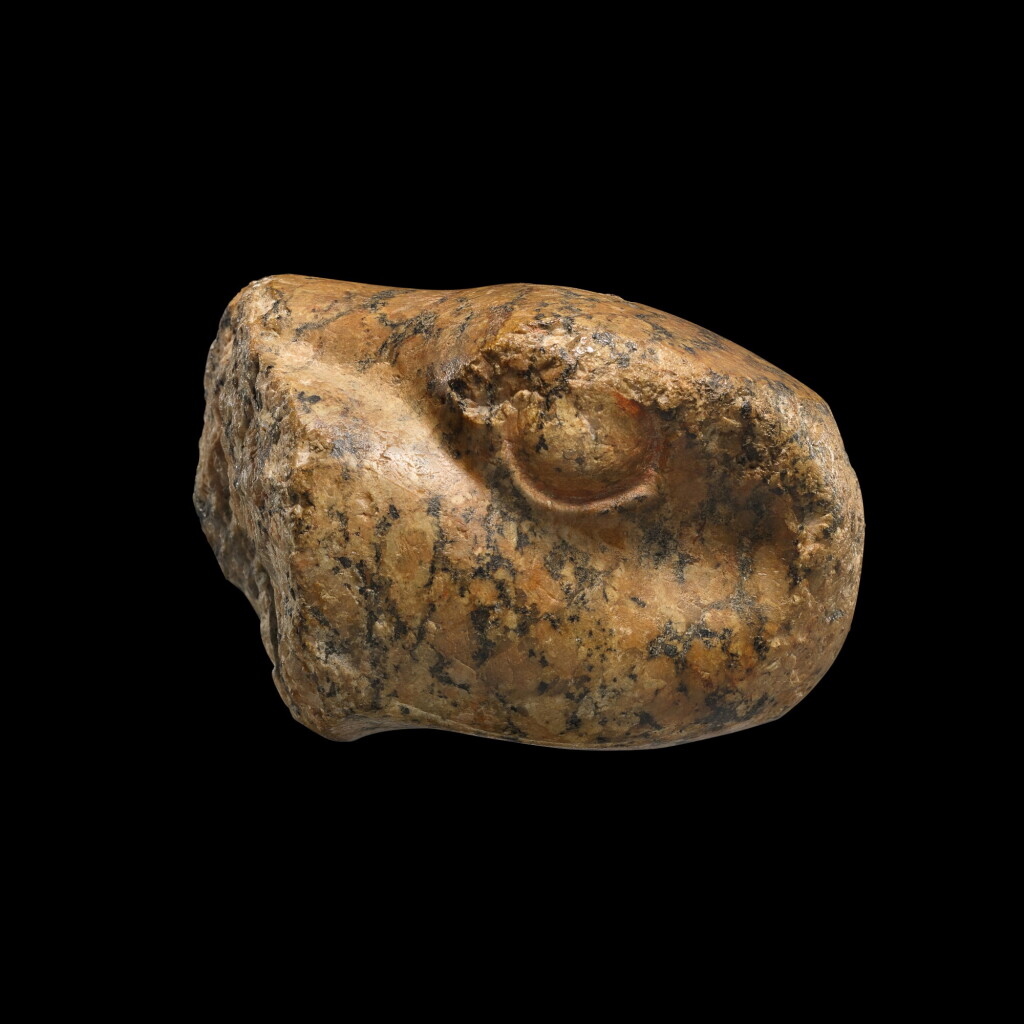 View full screen - View 1 of Lot 57. AN EGYPTIAN RED GRANITE HEAD OF A URAEUS SERPENT, NEW KINGDOM, PROBABLY 19TH DYNASTY, 1292-1190 B.C..