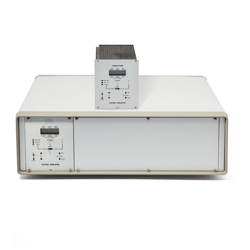 View full screen - View 1 of Lot 42. PATEK PHILIPPE | A MASTER CLOCK SYSTEM - ELECTRONIC MODULE AND COMPUTIME, CIRCA 1970.
