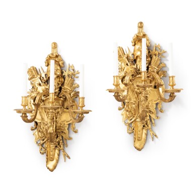 View full screen - View 1 of Lot 1386. A pair of French Regence style three-light wall appliques, Paris, circa 1880.