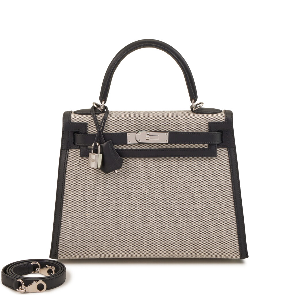 View full screen - View 1 of Lot 80. Black Swift and Écru Toile Kelly 28 Sellier Palladium Hardware, 2020.
