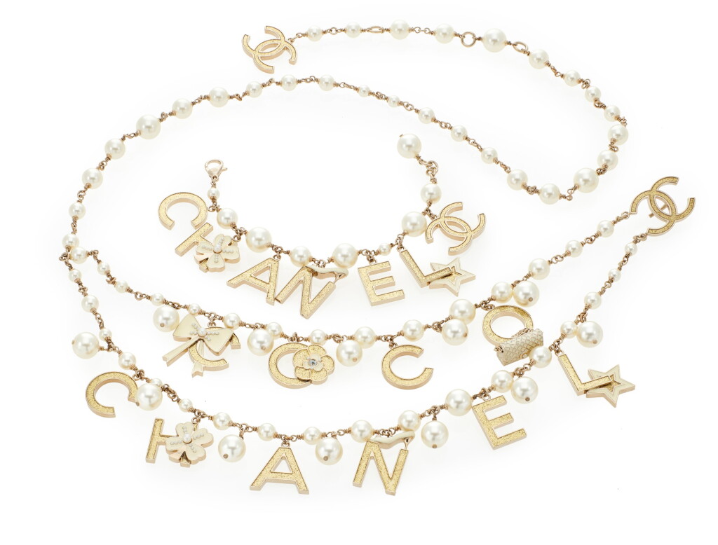 View full screen - View 1 of Lot 163. CHANEL | CHARM BELT AND BRACELET.