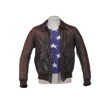 View full screen - View 1 of Lot 208. Freddie Mercury's favourite leather jacket, 1980s, with Stars and Stripes T-shirt, 1970s.