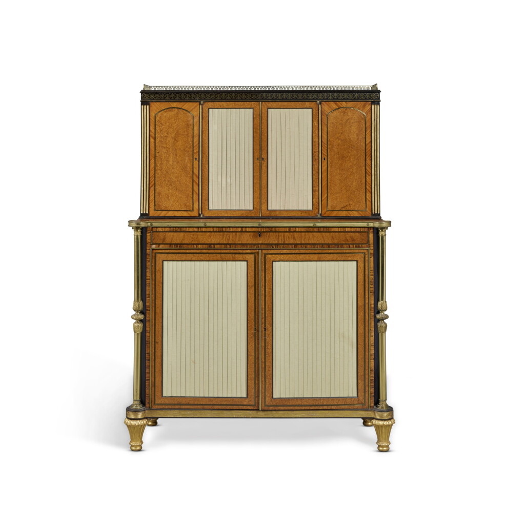 View full screen - View 1 of Lot 502. A Regency Amboyna Brass Inlaid and Mounted Ebonised and Parcel Gilt Kingwood Banded Side Cabinet, Circa 1810.