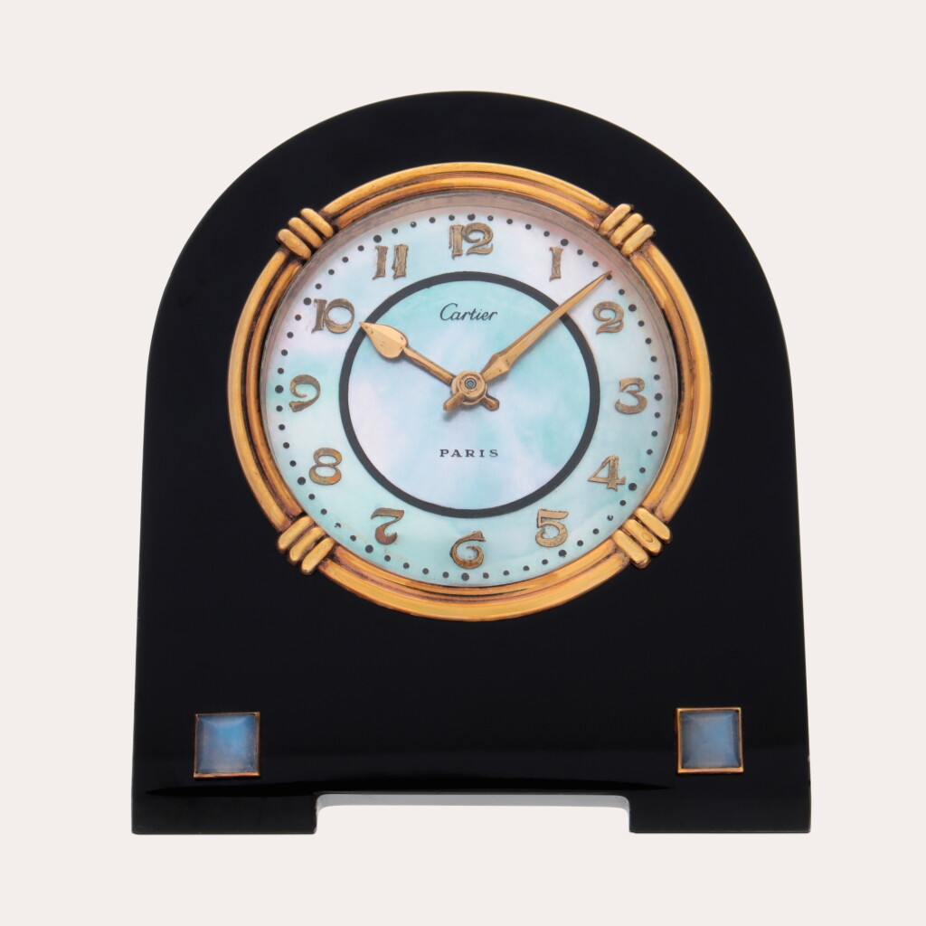 View full screen - View 1 of Lot 108. A fine onyx, gold, mother-of-pearl and moonstone 8-day arched desk timepiece | Nos. 1514, 2831 | Circa 1925.