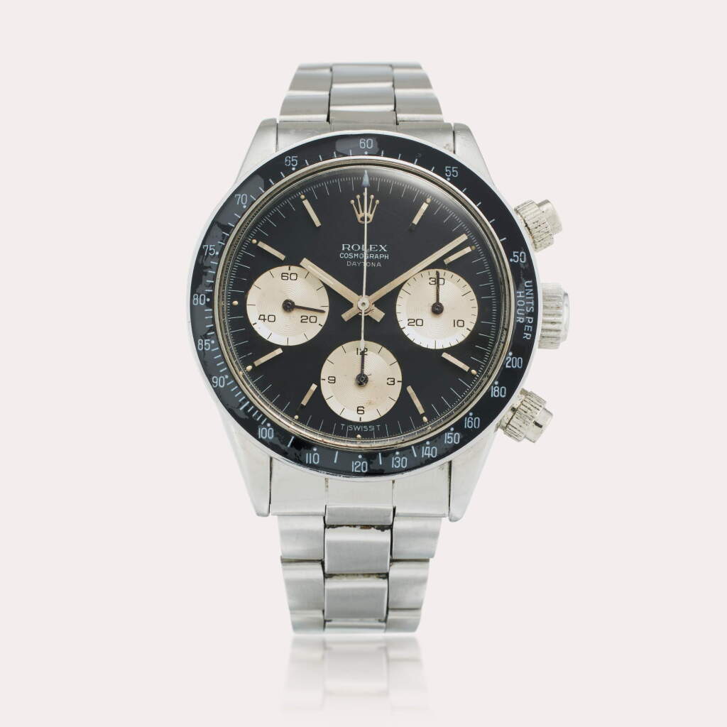 View full screen - View 1 of Lot 542. Reference 6240 ‘Small’ Daytona | A stainless steel chronograph wristwatch with bracelet, Circa 1966.