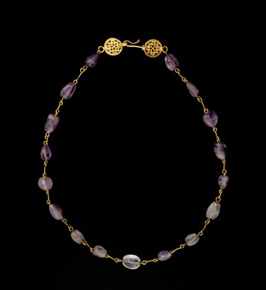 View full screen - View 1 of Lot 7. A BYZANTINE GOLD AND AMETHYST NECKLACE, CIRCA 5TH/7TH CENTURY A.D..