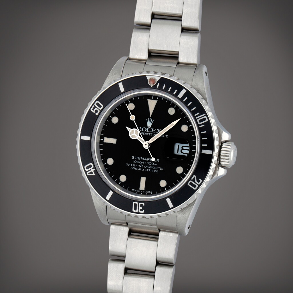 View full screen - View 1 of Lot 201. Submariner, Reference 168000 | A stainless steel wristwatch with date and bracelet | Circa 1987.