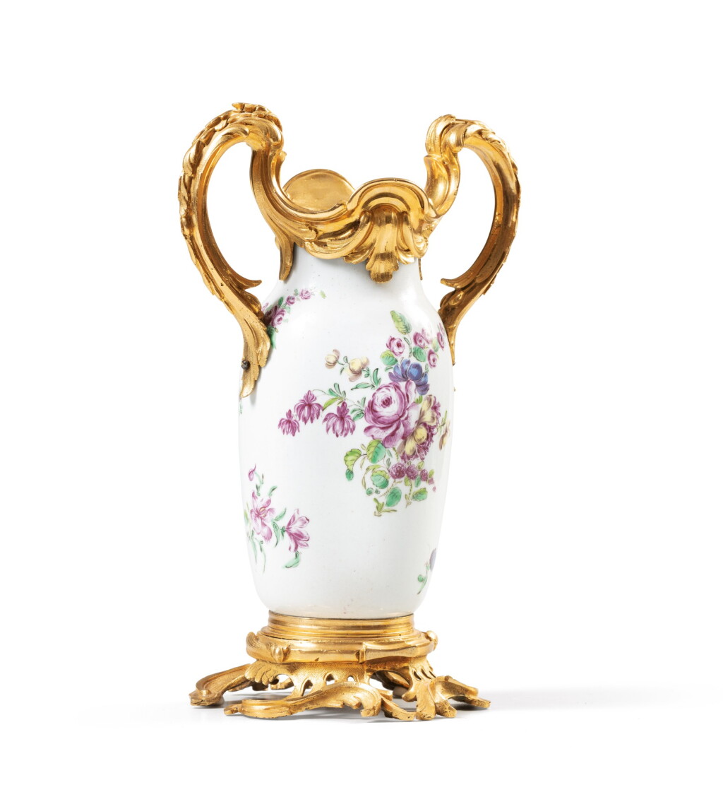 View full screen - View 1 of Lot 85. A Louis XV gilt-bronze mounted porcelain vase, the porcelain probably English, circa 1760, the mounts Louis XV, circa 1760-1770 | Vase en porcelaine probablement anglaise vers 1760 et monture de bronze doré d'époque Louis XV, vers 1760-1770.