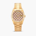 Day-Date, Reference 18238 | A yellow gold, diamond, sapphire and ruby-set wristwatch with day, date, honeycomb dial and bracelet, Circa 1996