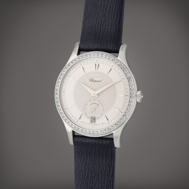 View full screen - View 1 of Lot 85. Reference 17/1860/2 L.U.C | A white gold and diamond-set wristwatch with date, Circa 2000.