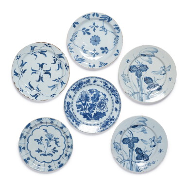 View full screen - View 1 of Lot 439. FIVE ENGLISH DELFTWARE BLUE AND WHITE PLATES PAINTED WITH FLOWERS, CIRCA 1750-70.