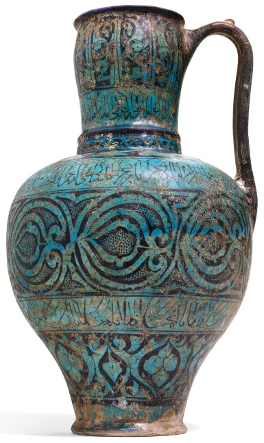 View full screen - View 1 of Lot 98. A RARE AND IMPORTANT KASHAN TURQUOISE GLAZED POTTERY PITCHER, PERSIA, CIRCA 1200-20 AD.
