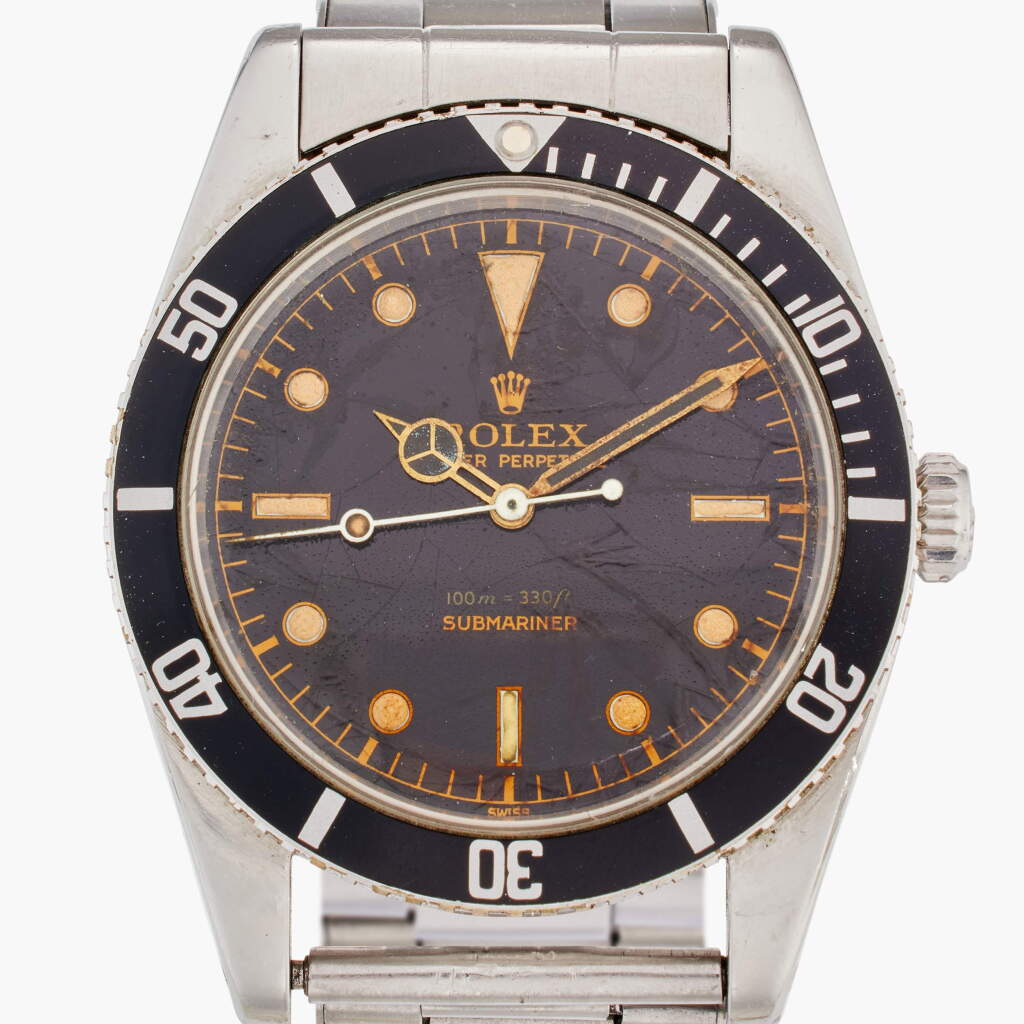 View full screen - View 1 of Lot 397. Reference 5508 'Small Crown' Submariner | A stainless steel automatic wristwatch with gilt dial and bracelet, Circa 1958.