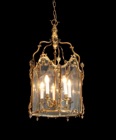 View full screen - View 1 of Lot 72. A Louis XV gilt-bronze lantern, circa 1770, with later arms of light | Lanterne en bronze doré de la fin de l'époque Louis XV, vers 1770, le bouquet de lumière d’époque postérieure.