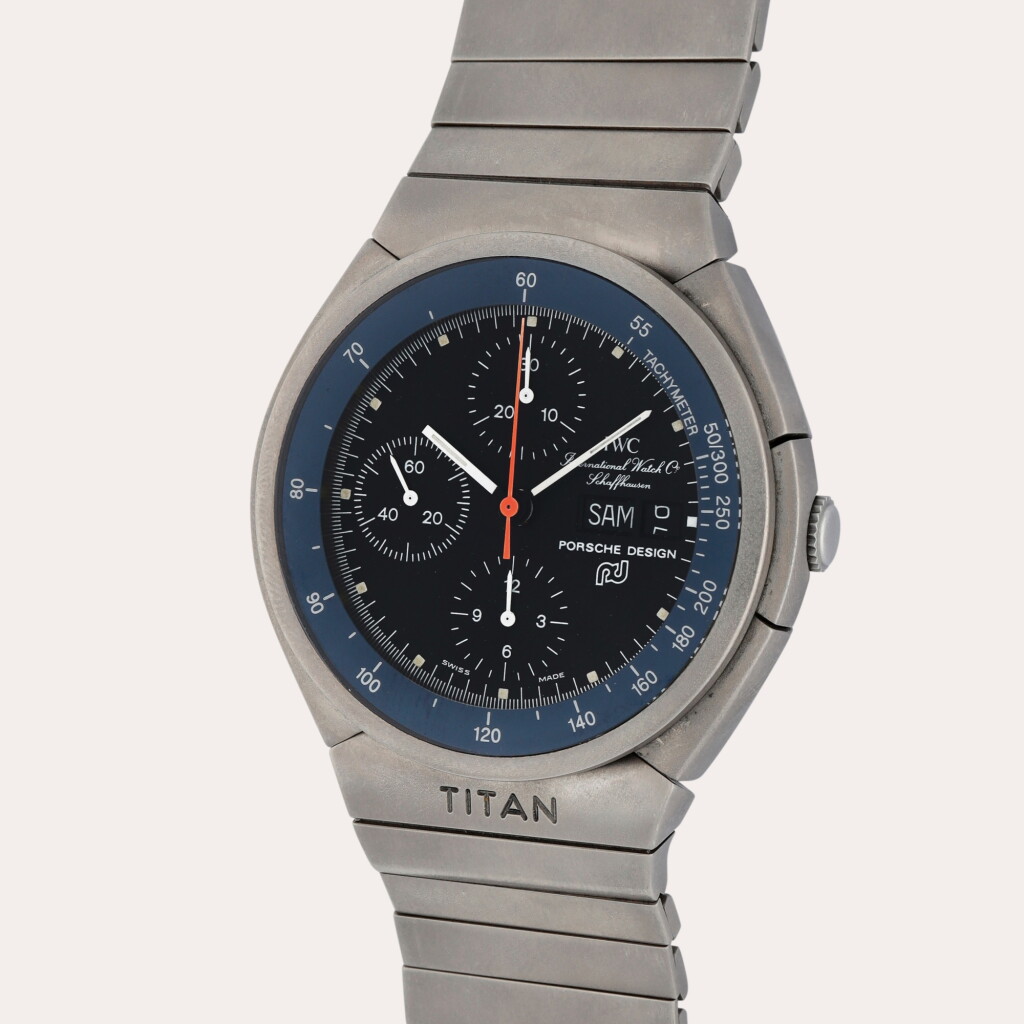 View full screen - View 1 of Lot 377. Titan, Reference IW3700 | A titanium chronograph wristwatch with day, date and bracelet | Circa 1980.