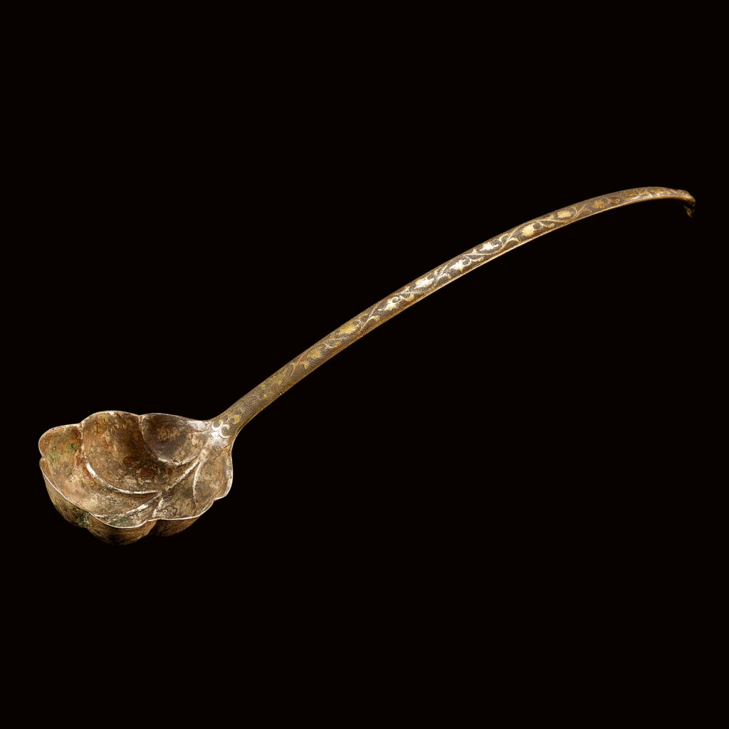 View full screen - View 1 of Lot 32. A RARE AND LARGE ENGRAVED SILVER LADLE TANG DYNASTY | 唐 銀鏨刻花鳥紋花葉式勺.