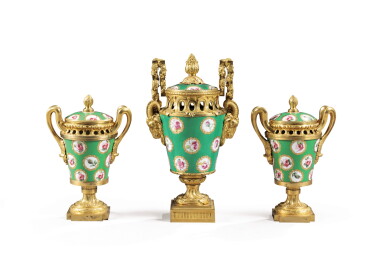 View full screen - View 1 of Lot 217. An assembled garniture of three gilt-bronze mounted Sèvres porcelain vases and covers, the pair circa 1770, the single vase circa 1820.