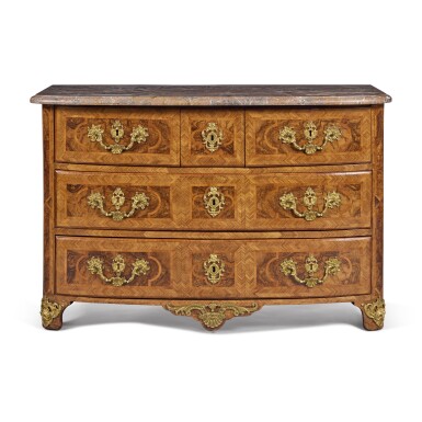 View full screen - View 1 of Lot 642. A Régence Gilt-Bronze Mounted Walnut, Olivewood and Inlaid Commode, Circa 1725.