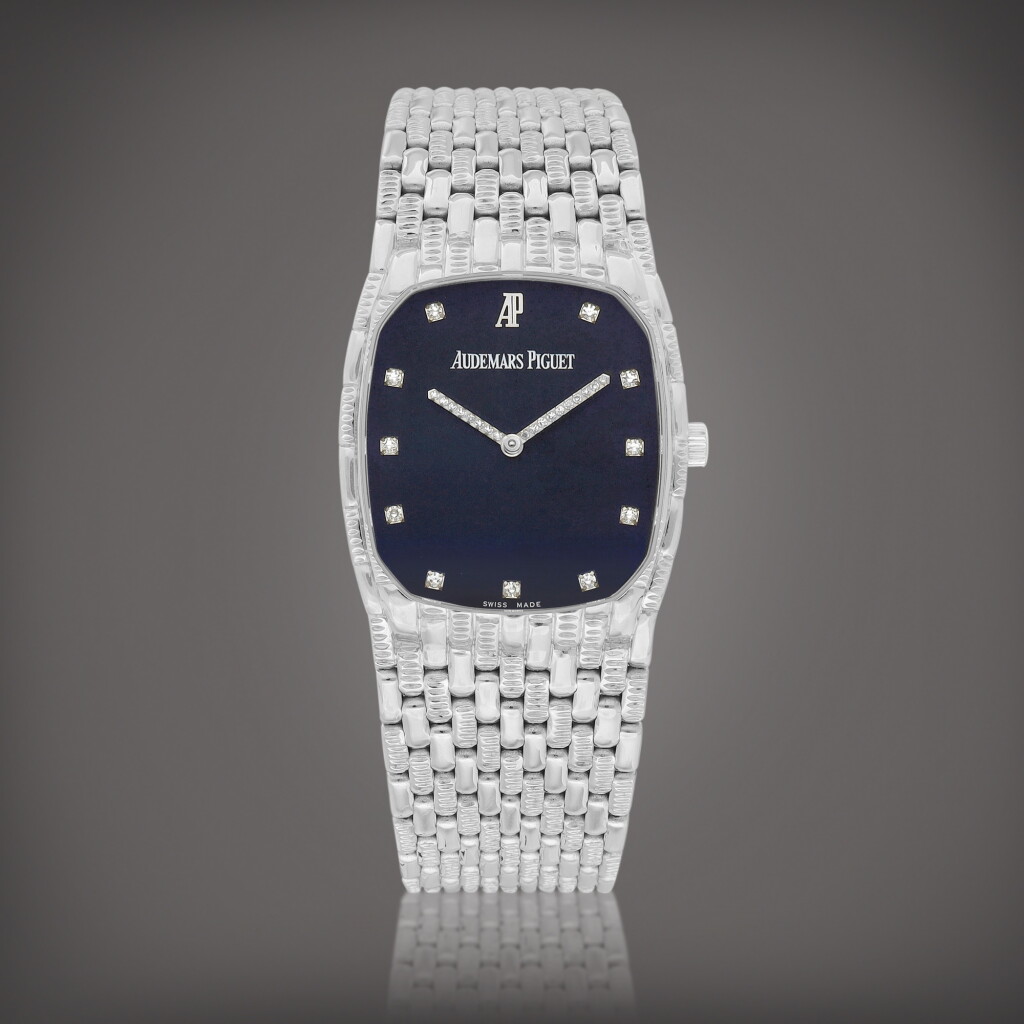 View full screen - View 1 of Lot 847. A white gold and diamond-set bracelet watch, Circa 1990 | 愛彼 | 白金鑲鑽石鏈帶腕錶,約1990年製.