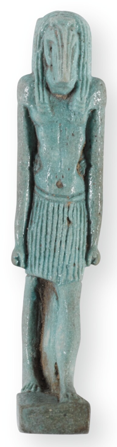 View full screen - View 1 of Lot 176. AN EGYPTIAN PALE GREEN-GLAZED AMULETIC FIGURE OF THE IBIS-HEADED GOD THOTH, 26TH DYNASTY, CIRCA 664-525 B.C..
